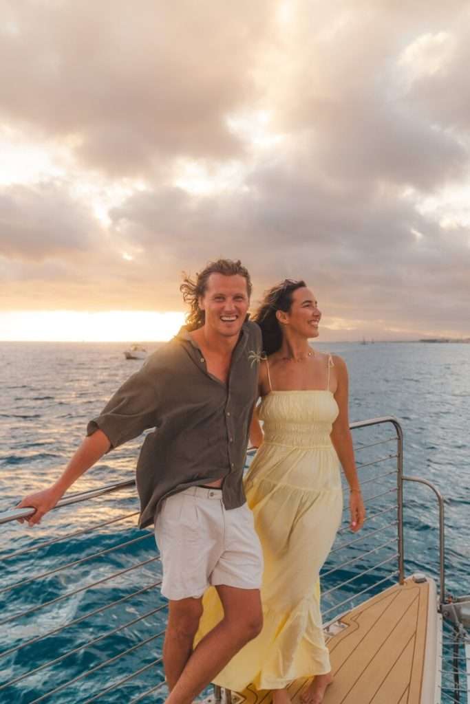 couple on a boat enjoying a hawaii holokai catamaran sunset cruise