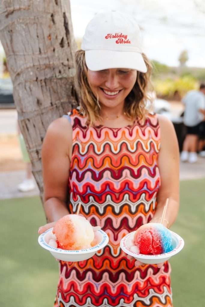 female holding bowls of matsumoto shaved ice